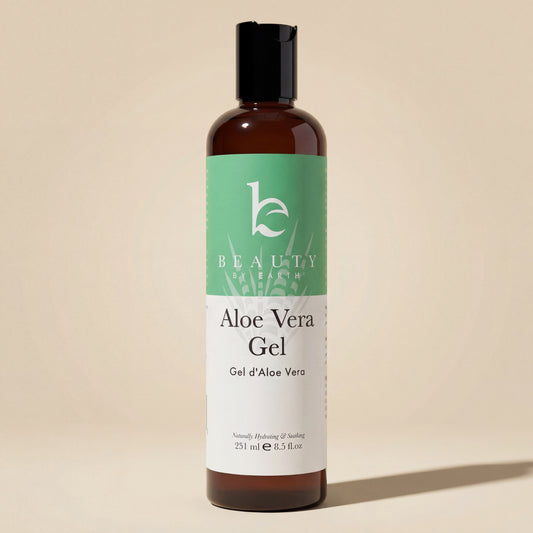 Bottle of Aloe Vera Gel with a green label on a beige background