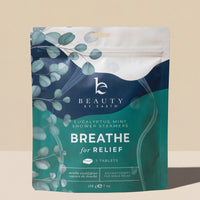 Packaging of Beauty by Earth Eucalyptus Mint Shower Steamers on a beige background