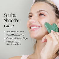 A woman smiling while using a green heart-shaped jade facial massage tool on her cheek, with text on the left reading 'Sculpt. Shoothe Glow' and product details.