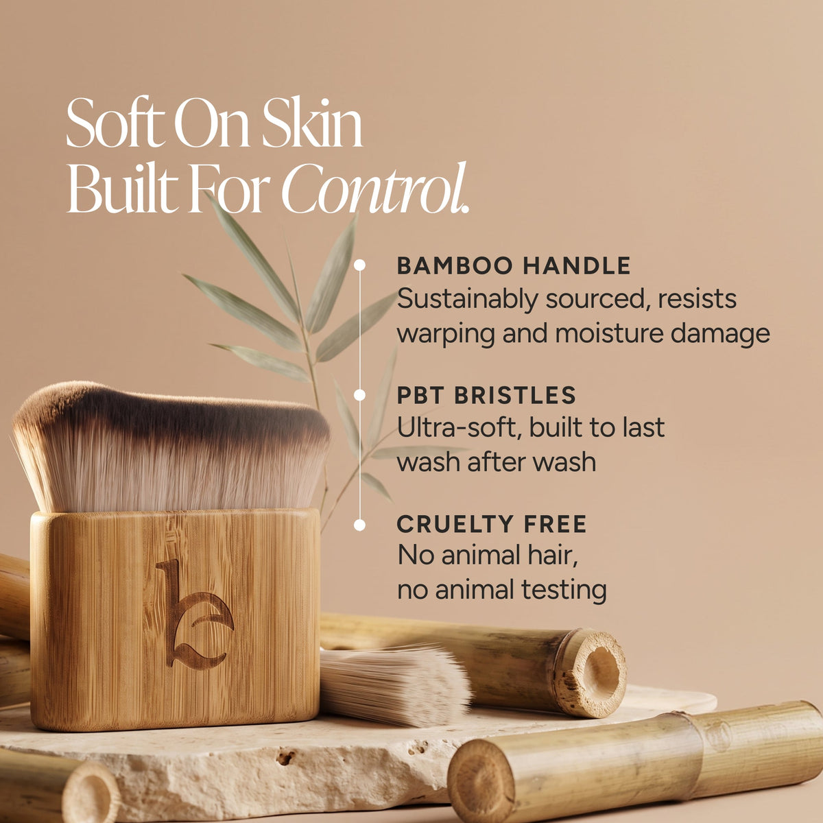 A bamboo-handled brush in a matching bamboo holder, shown on a warm beige background with text callouts about bamboo handle, PBT bristles, and cruelty-free quality.