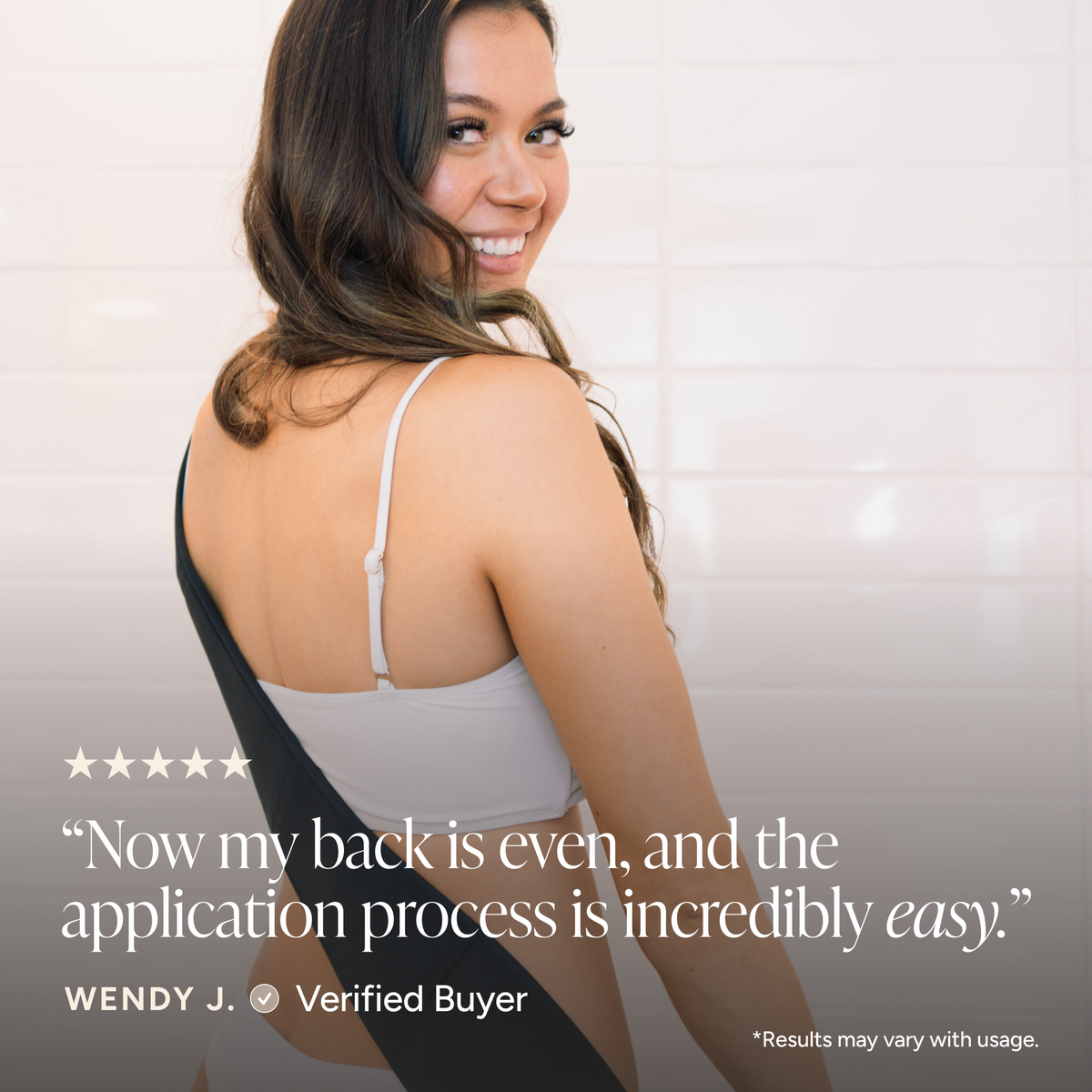 A woman in a white tank top using back applicator bright bathroom, with a quote overlay reading, 'Now my back is even, and the application process is incredibly easy.' Wendy J.