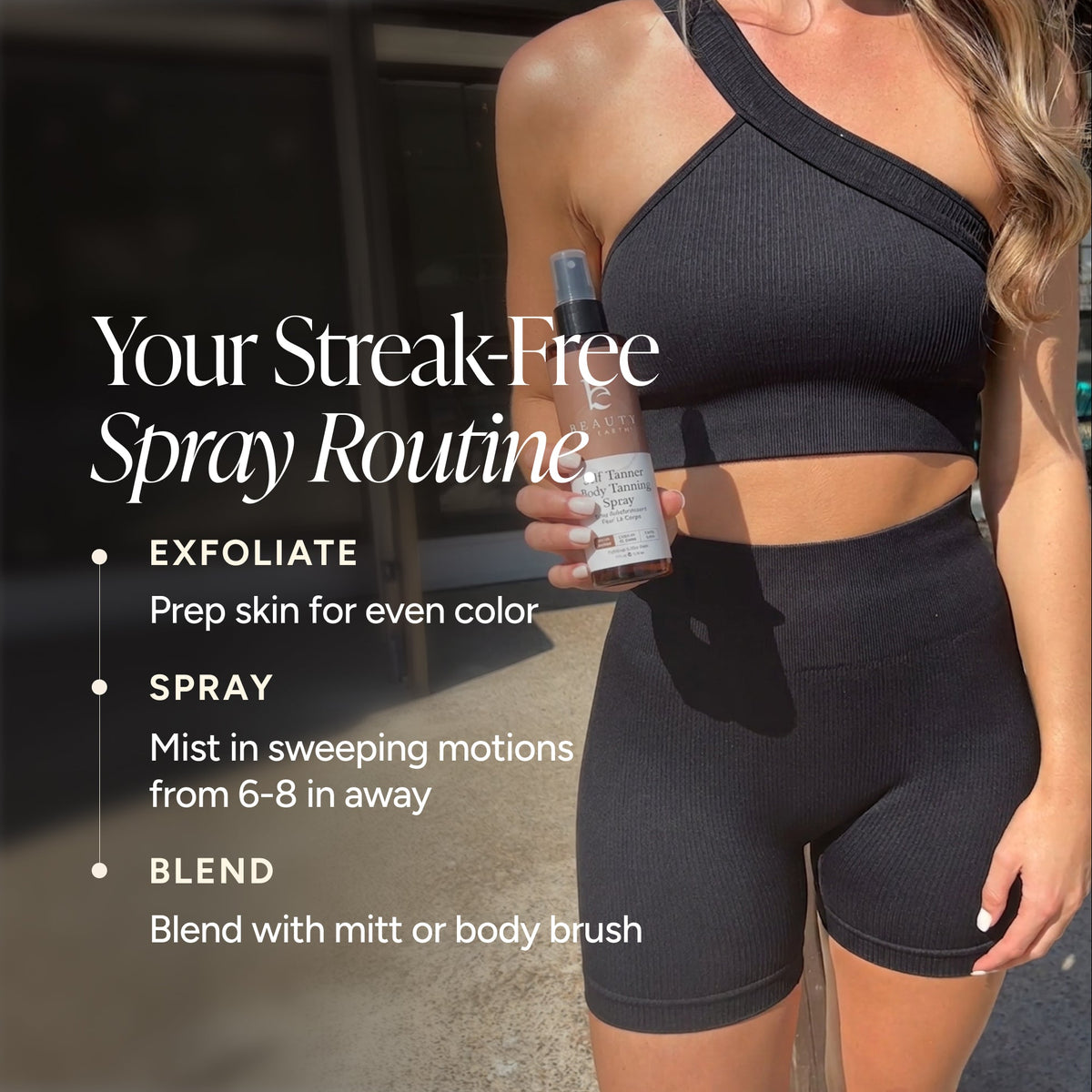 A woman in a black ribbed activewear set holds a bottle of Body Spray.