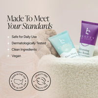 Beauty by Earth facial care products displayed in a soft beige setting, featuring a light blue face wash gel tube and a purple cleansing face scrub tube nestled in a plush cream-colored towel. 