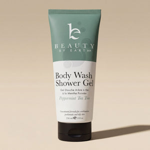 Body wash shower gel peppermint tea tree tube with 'Beauty by Earth' branding