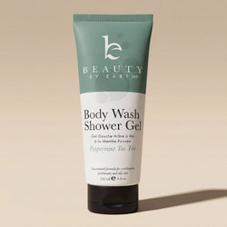 Body wash shower gel peppermint tea tree tube with 'Beauty by Earth' branding
