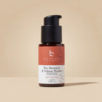 Beauty by Earth dry shampoo and volume powder bottle on a white background