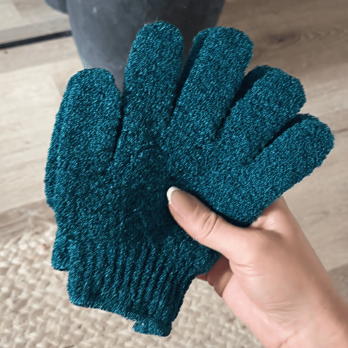 Exfoliating gloves in model hand