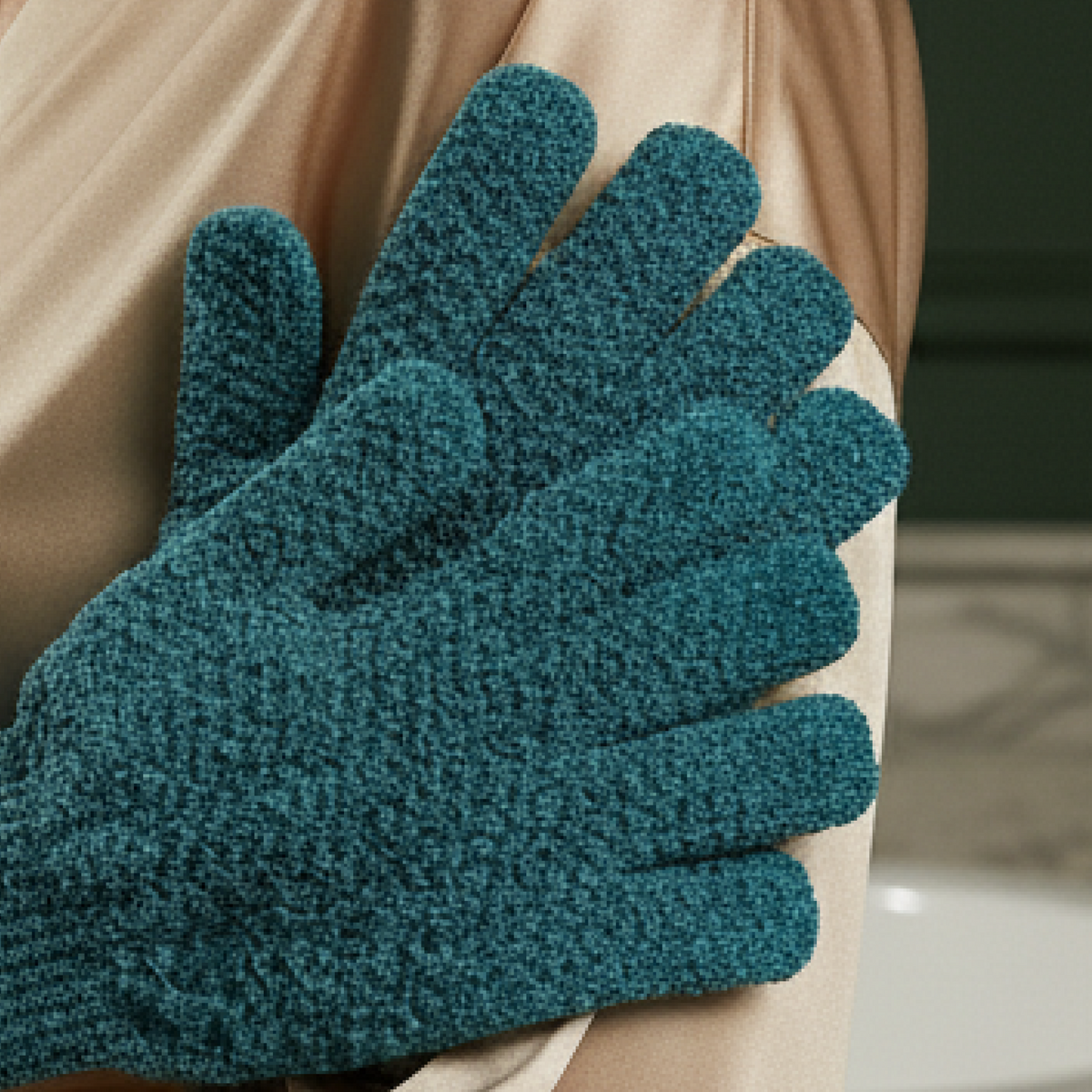 Medium exfoliating glove on a person's hand with a neutral background