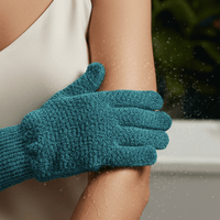 Exfoliating medium glove being used on a person's arm with a blurred background
