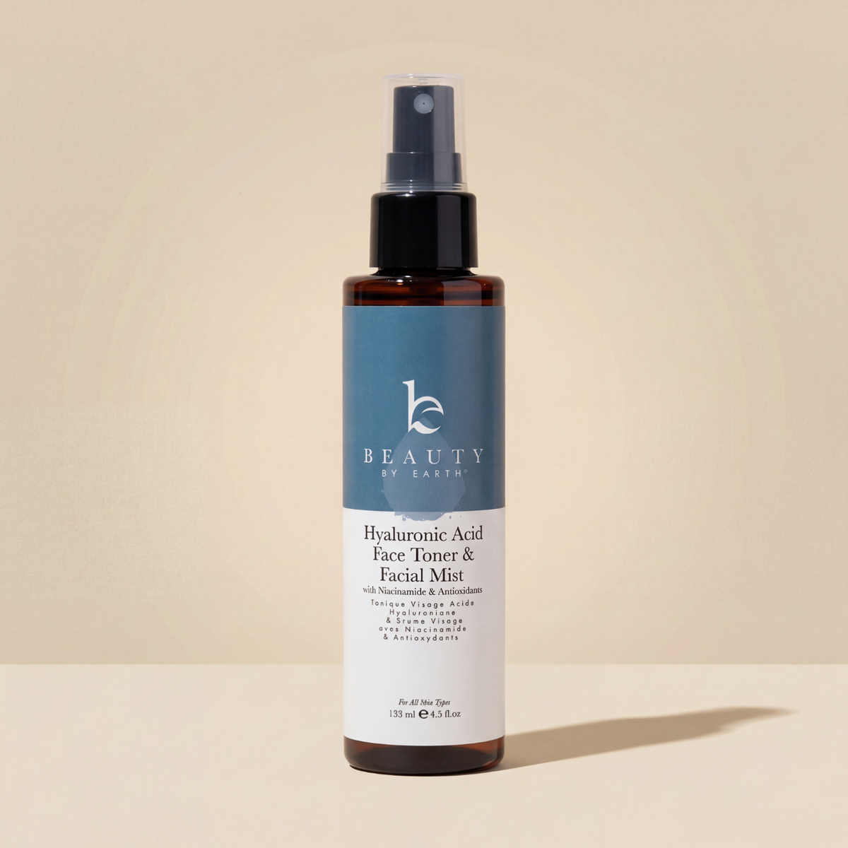 Hyaluronic Acid Face Toner & Facial Mist bottle on a beige background