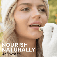 Woman applying lip balm with text 'Nourish Naturally Unflavored' on a blurred outdoor background