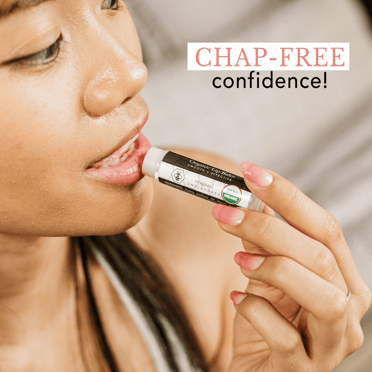 Person applying lip balm with 'Chap-Free confidence!' text above.