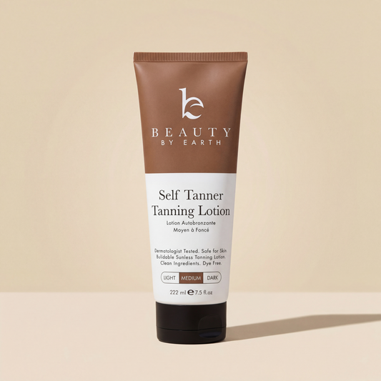 Tube of Beauty by Earth Self Tanner Tanning Lotion on a beige background