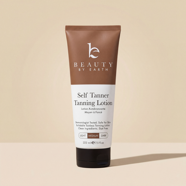 Tube of Beauty by Earth Self Tanner Tanning Lotion on a beige background