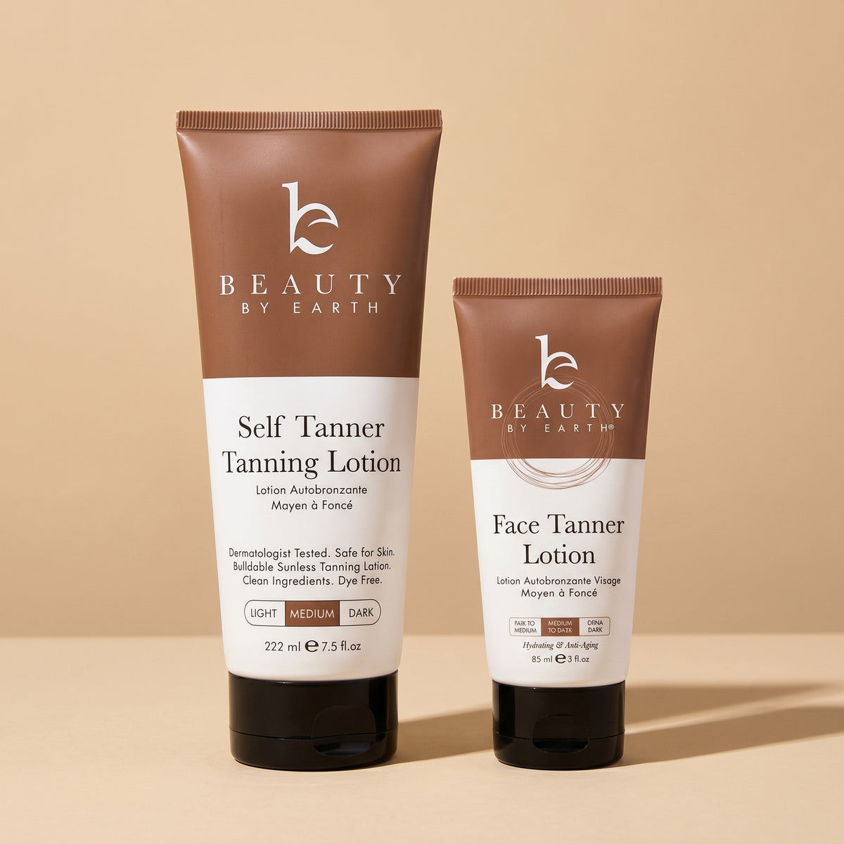 Two tubes of 'Beauty by Earth' tanning lotion on a beige background